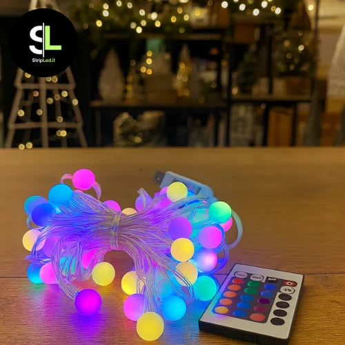 Ghirlanda LED RGBIC 10 metri accesa con telecomando, ambientazione negozio e logo stripled.it
