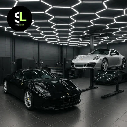 Sistema Hexagon LED 220V bianco freddo installato in garage auto professionale con logo StripLed.it