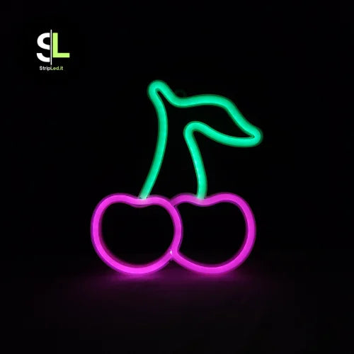 Insegna luminosa LED neon ciliegia accesa con luce rosa e verde brillante su sfondo nero e logo StripLed.it
