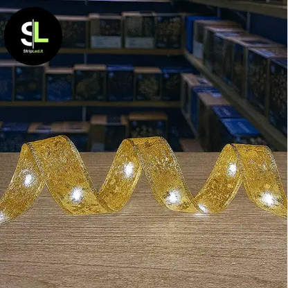 Nastro natalizio oro illuminato 6000K in negozio con logo Stripled.it